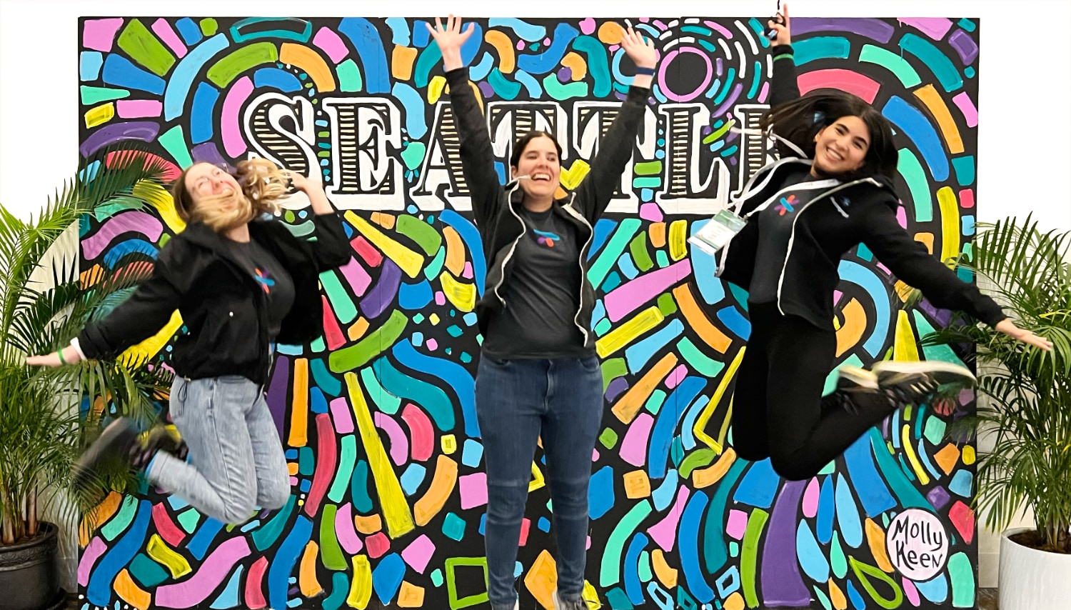 Sourcegraph team members jumping